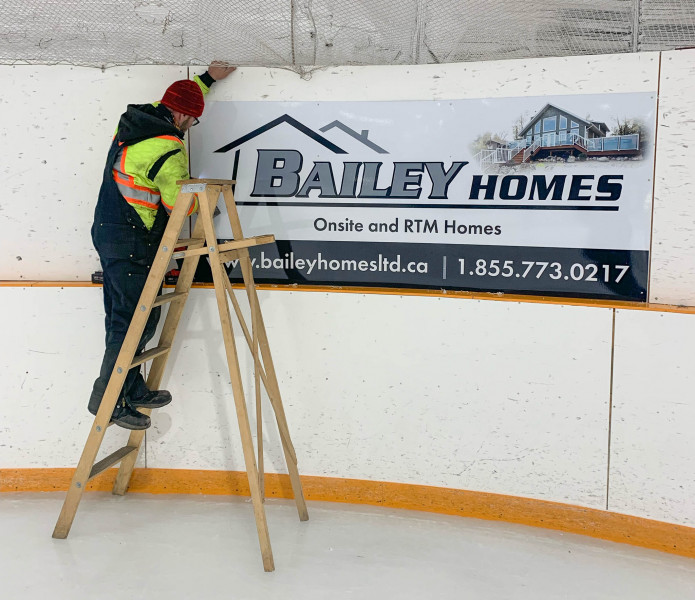 New sign going up at the Oakville Arena.