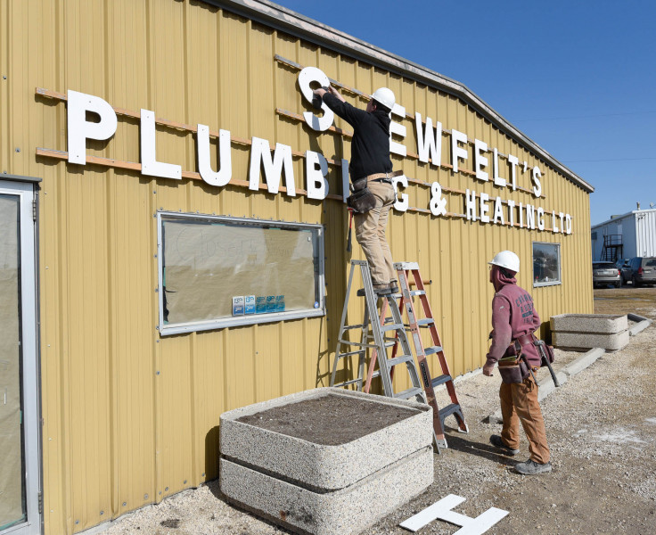 Iconic Shewfelt\'s sign comes down during our renovations.