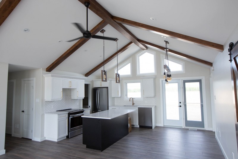 Living room facing kitchen.