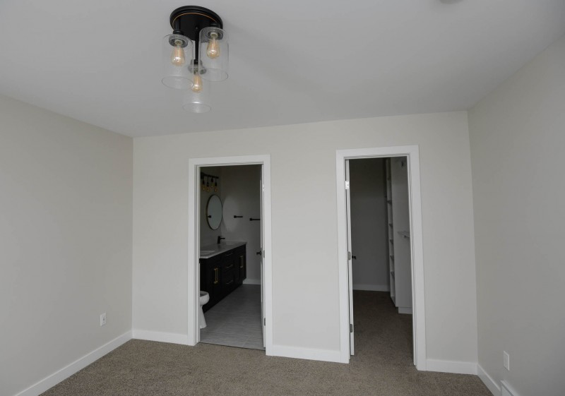 Master bedroom looking into ensuite and closet.