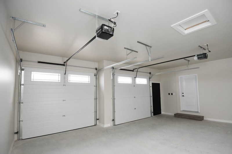 Two car garage 10x8 overheads with openers and windows